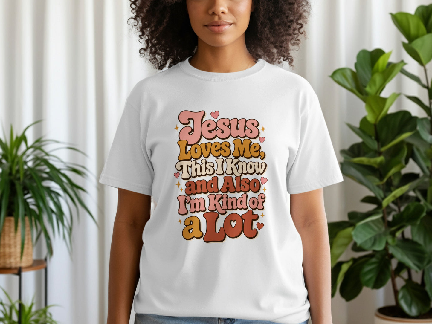 White t-shirt with "Jesus Loves Me, This I Know and Also I'm Kind of a Lot" text.