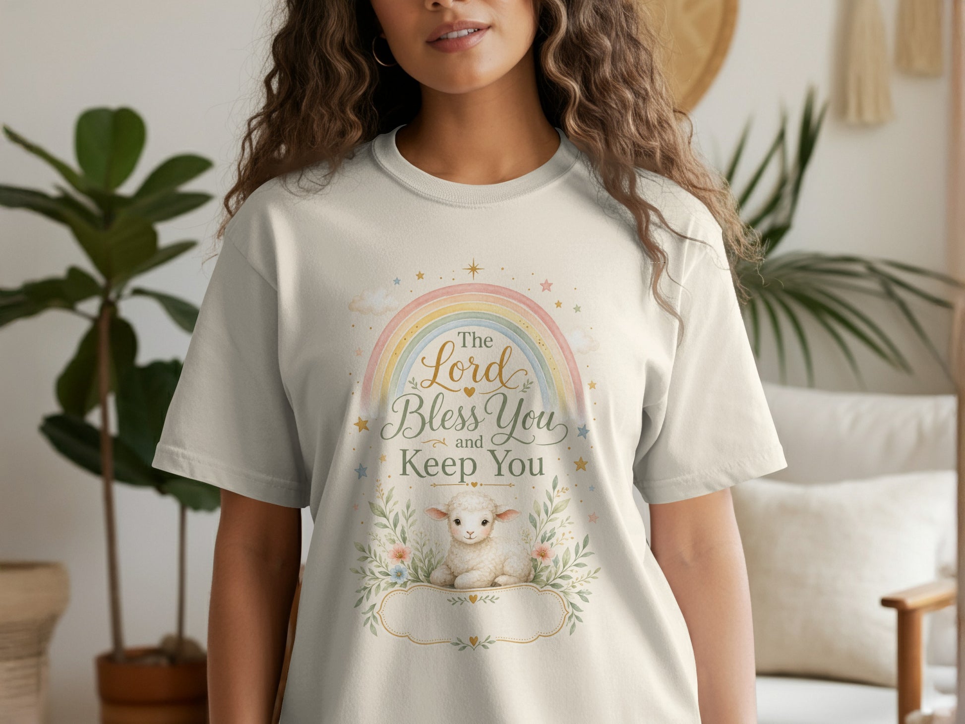 Cream t-shirt with rainbow, stars, and text "The Lord Bless You and Keep You".