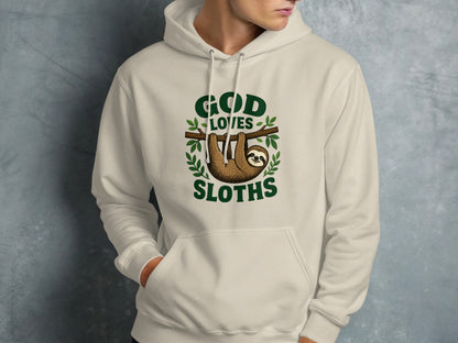 Cream hoodie with "God Loves Sloths" text and a sloth hanging from a branch.