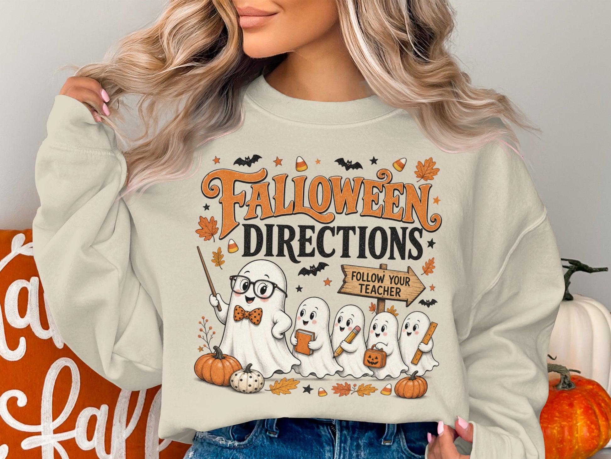 Halloween Directions graphic with teacher ghost and student ghosts holding school supplies.