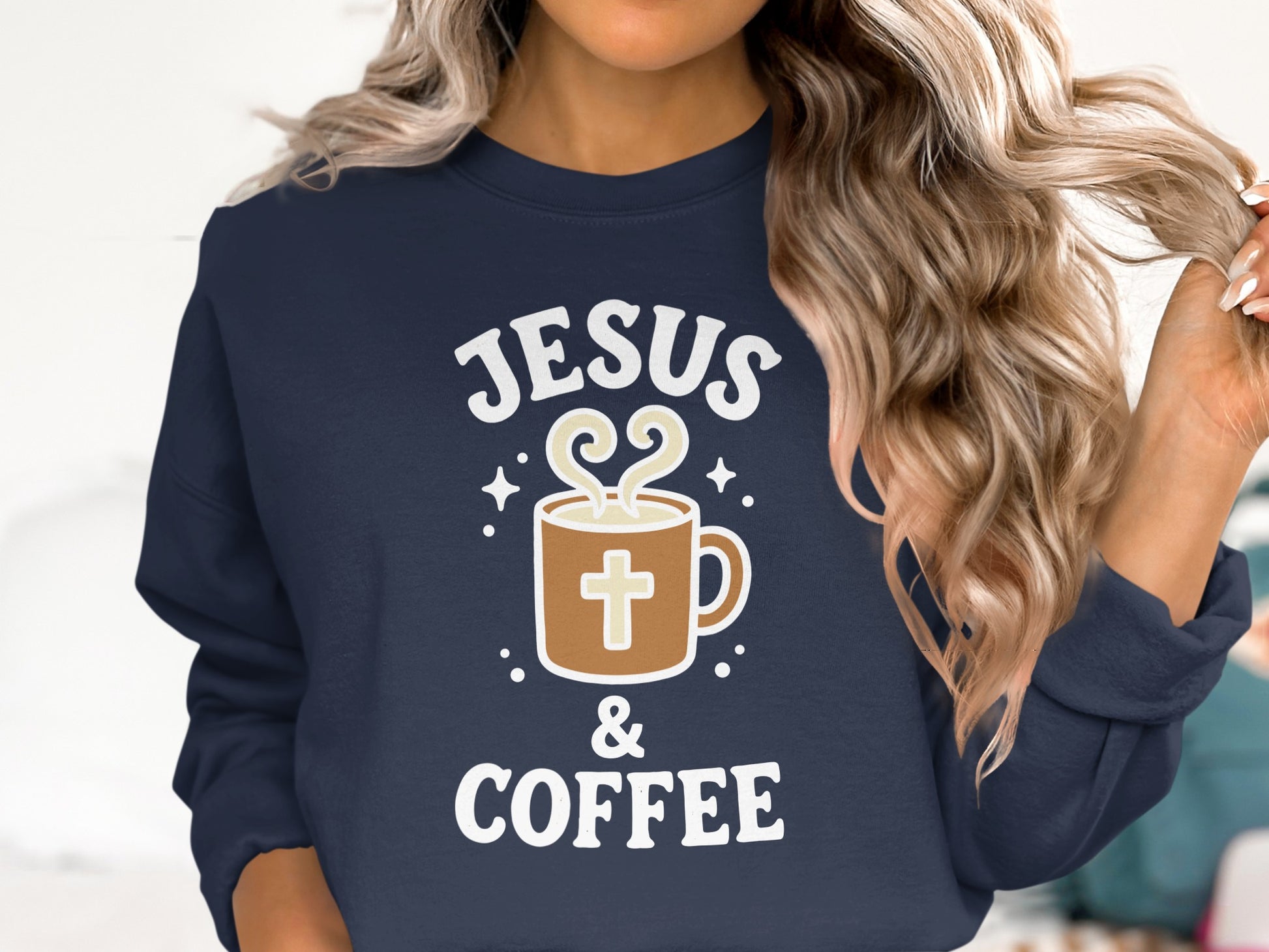 Navy sweatshirt with "Jesus & Coffee" text and a coffee mug graphic.