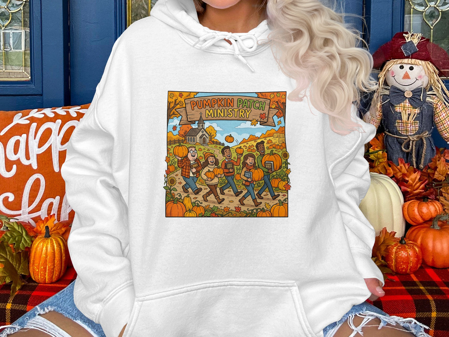 Hoodie with "Pumpkin Patch Ministry" cartoon of people carrying pumpkins.
