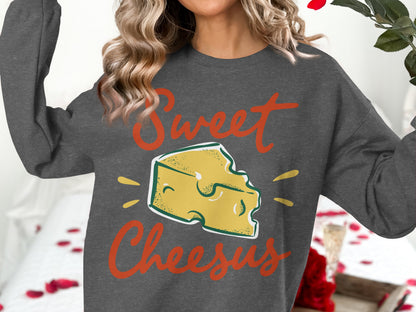 Dark grey sweatshirt with "Sweet Cheesus" text and cheese graphic.