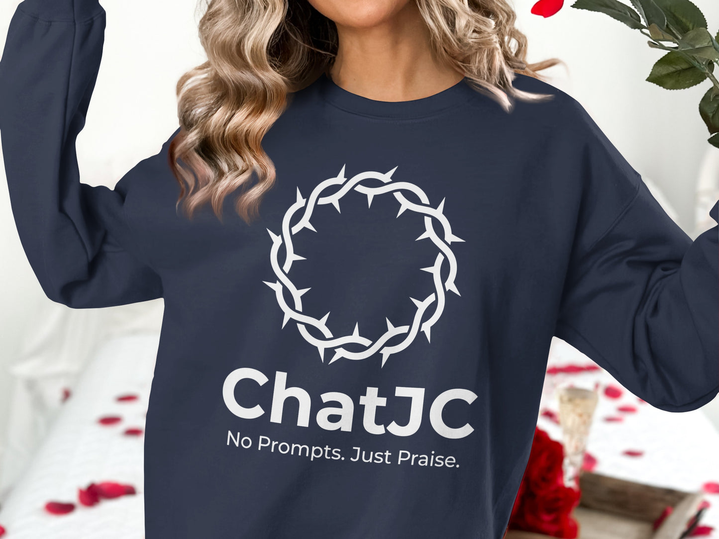 Navy sweatshirt with white ChatJC logo and crown of thorns design.