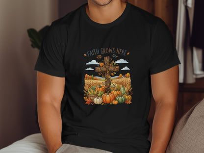 Black t-shirt with a fall harvest scene featuring a cross and pumpkins.