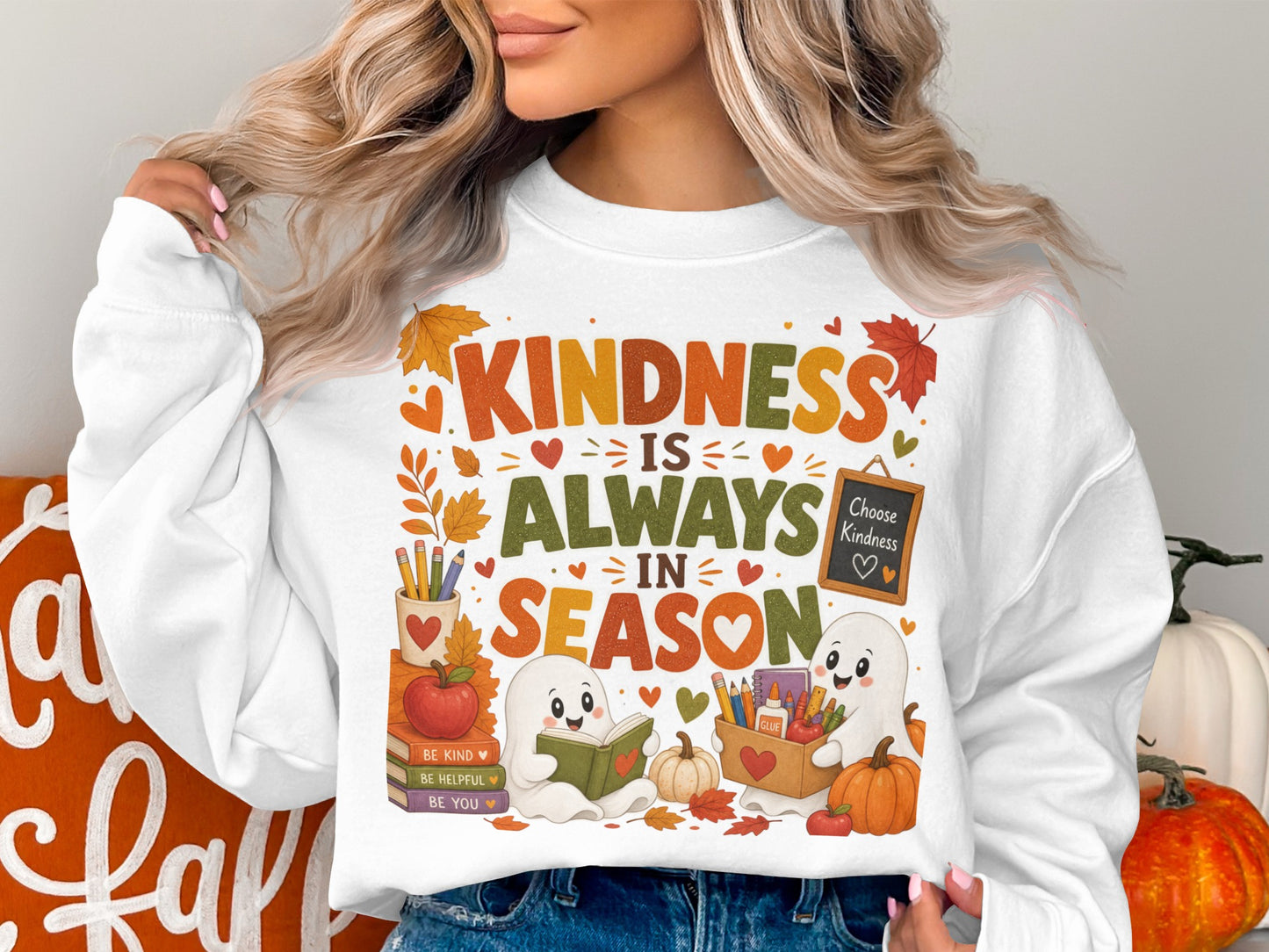 Two ghosts reading with books, pumpkins, and the words "Kindness is Always in Season".