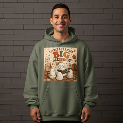 Green hoodie with graphic of ghosts reading and text "Little Learners Big Blessings".