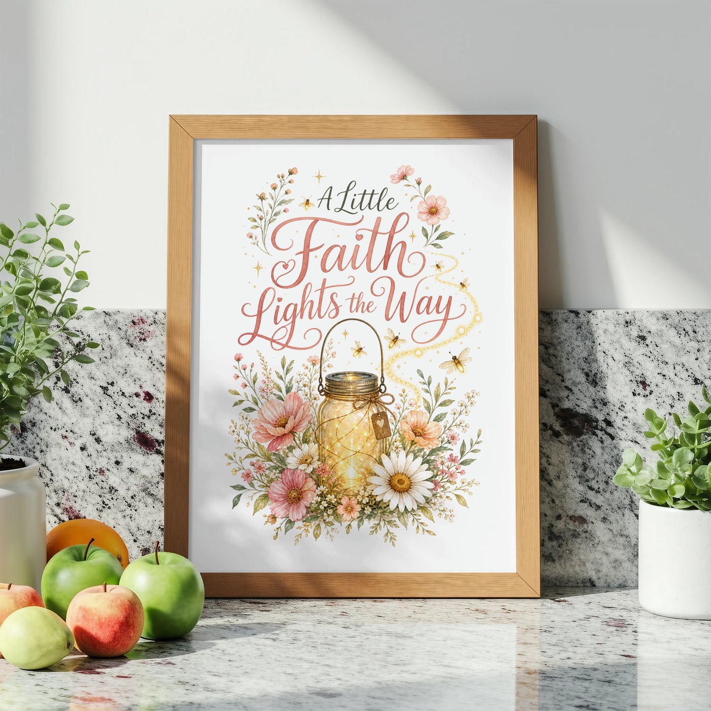 Framed art with text "A Little Faith Lights the Way" and a glowing jar.