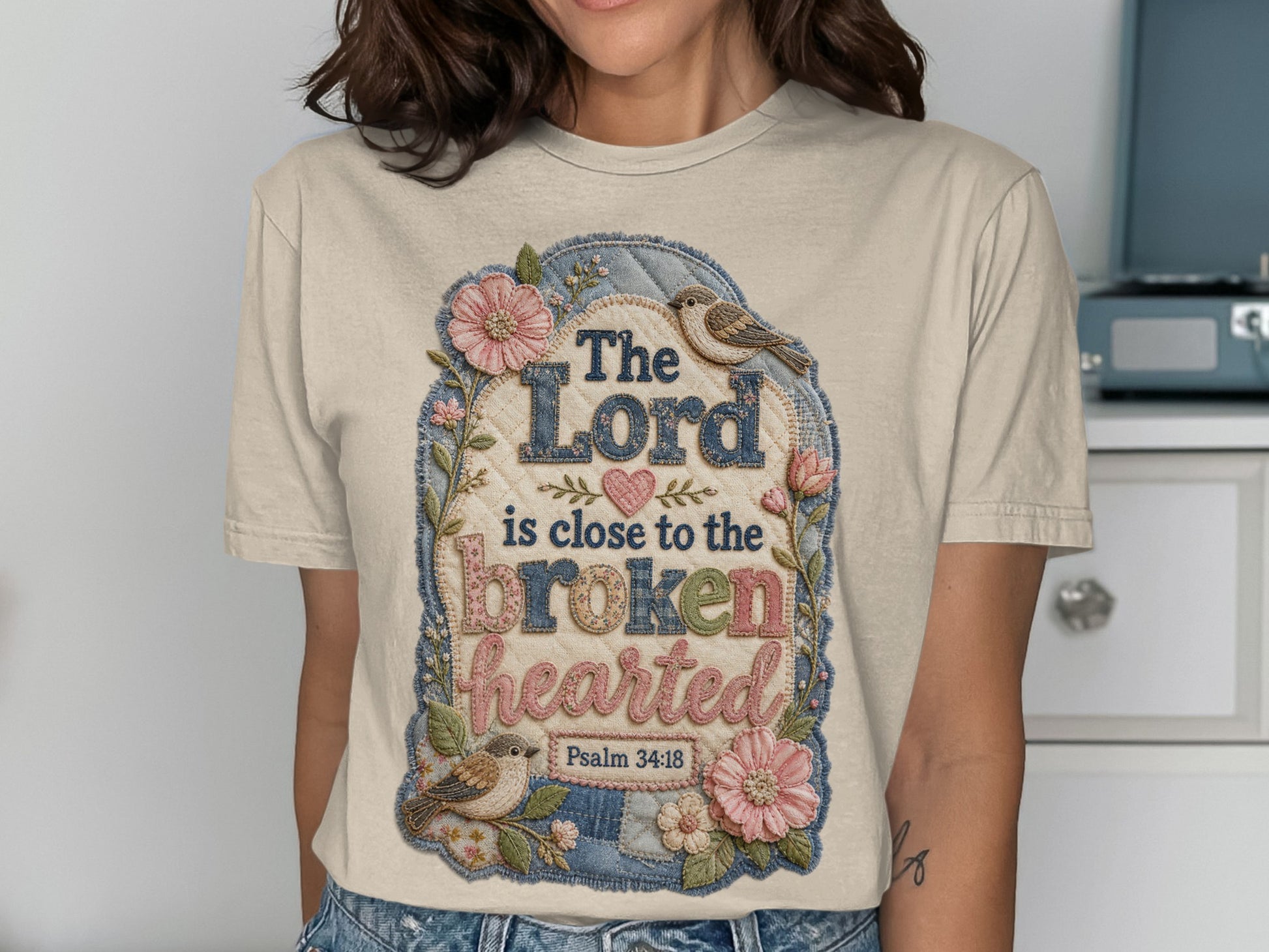 T-shirt with "The Lord is close to the brokenhearted" and Psalm 34:18.