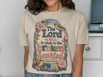 T-shirt with "The Lord is close to the brokenhearted" and Psalm 34:18.