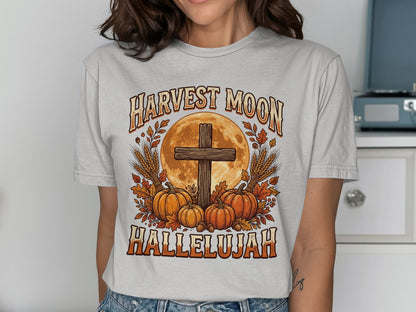 Harvest Moon Hallelujah graphic with cross, pumpkins, and wheat.