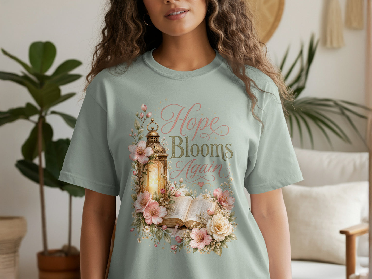 Light mint t-shirt with "Hope Blooms Again" text and floral design.