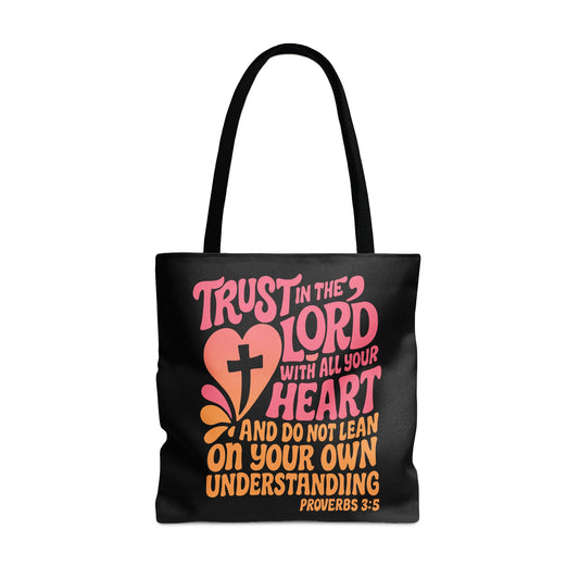 Black tote bag with "Trust in the Lord with all your heart" text.