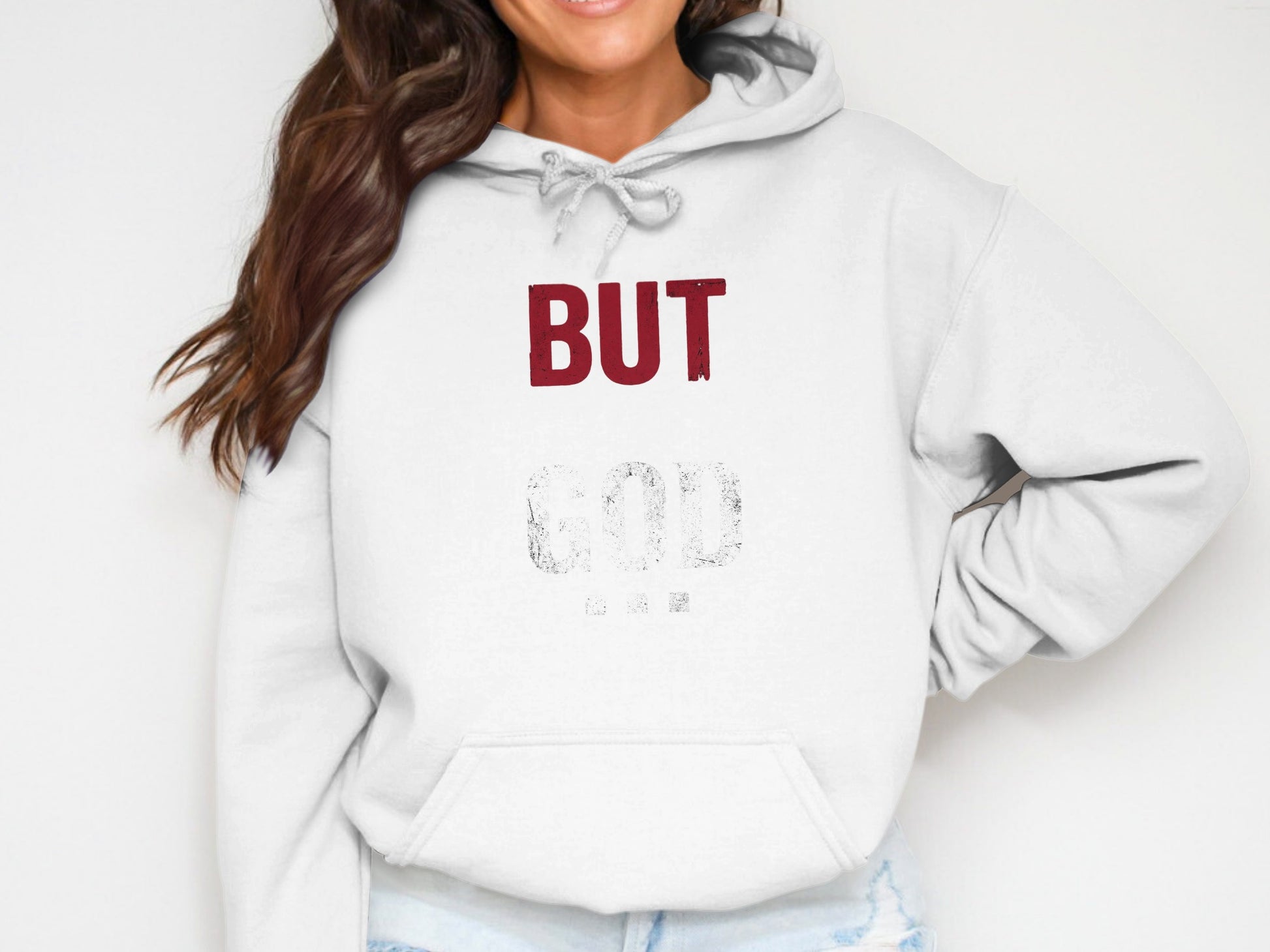 White hoodie with "BUT GOD" text in maroon and grey.