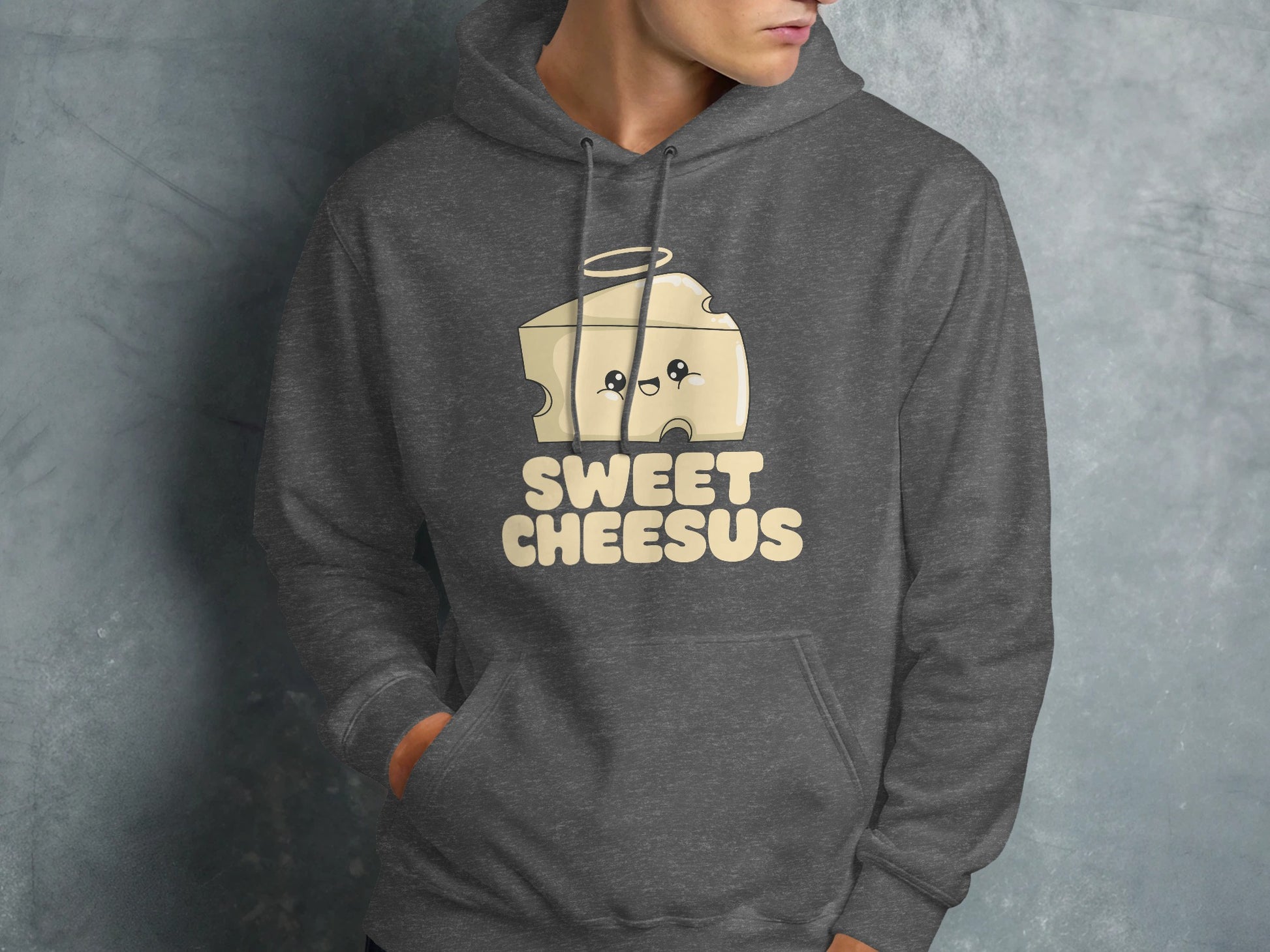 Dark grey hoodie with "SWEET CHEESUS" text and a cartoon cheese slice character.