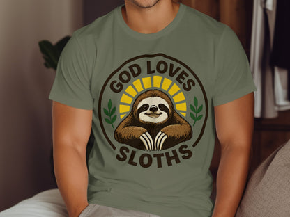 Green t-shirt with "God Loves Sloths" text and a sloth illustration.
