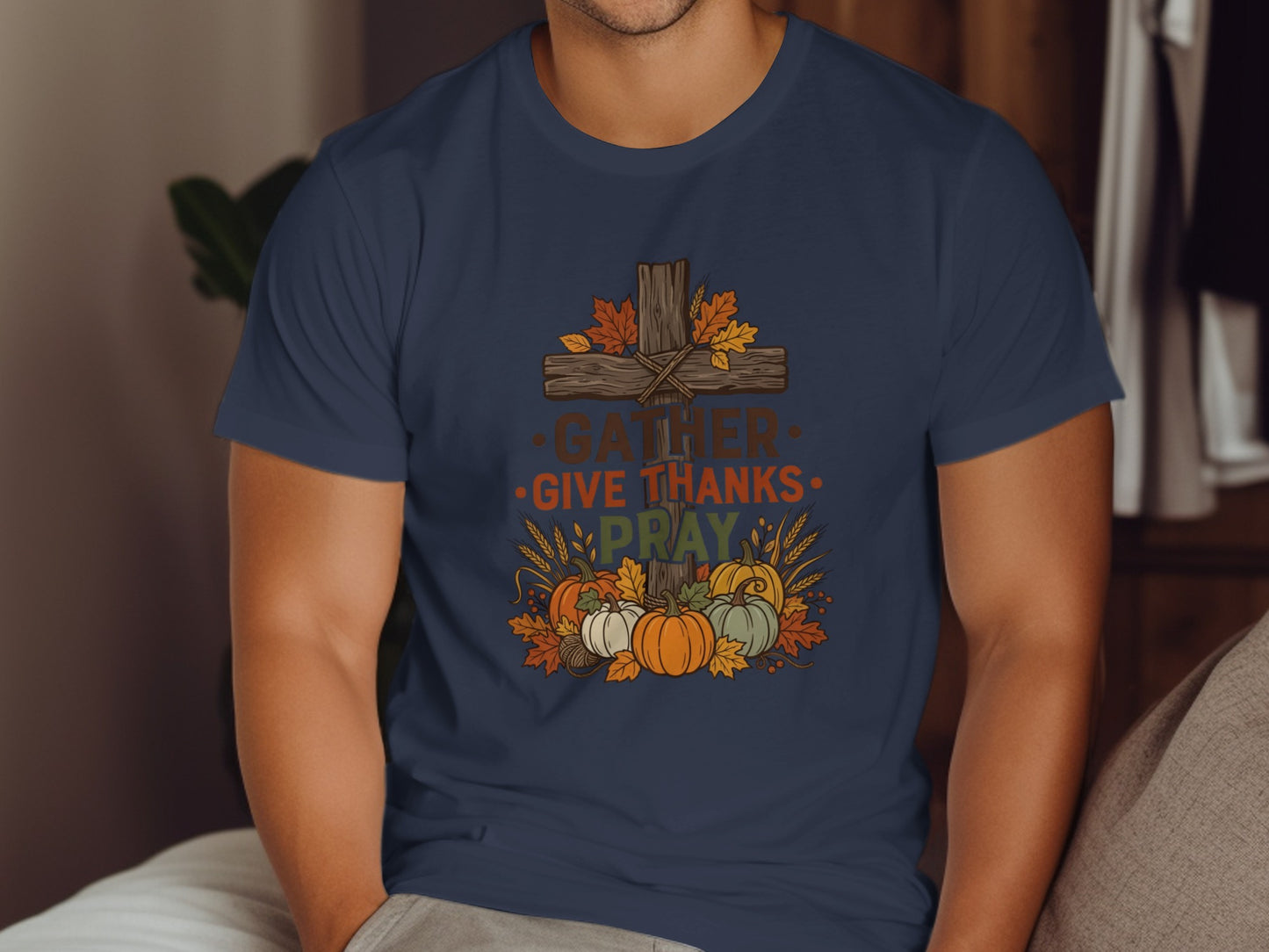 Cross with "Gather Give Pray" text surrounded by pumpkins and fall leaves.