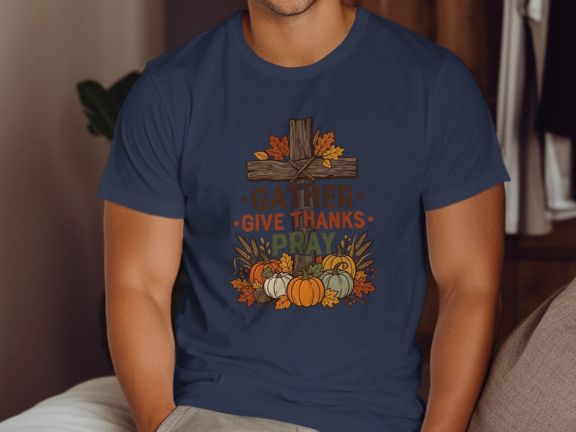 Cross with "Gather Give Pray" text surrounded by pumpkins and fall leaves.