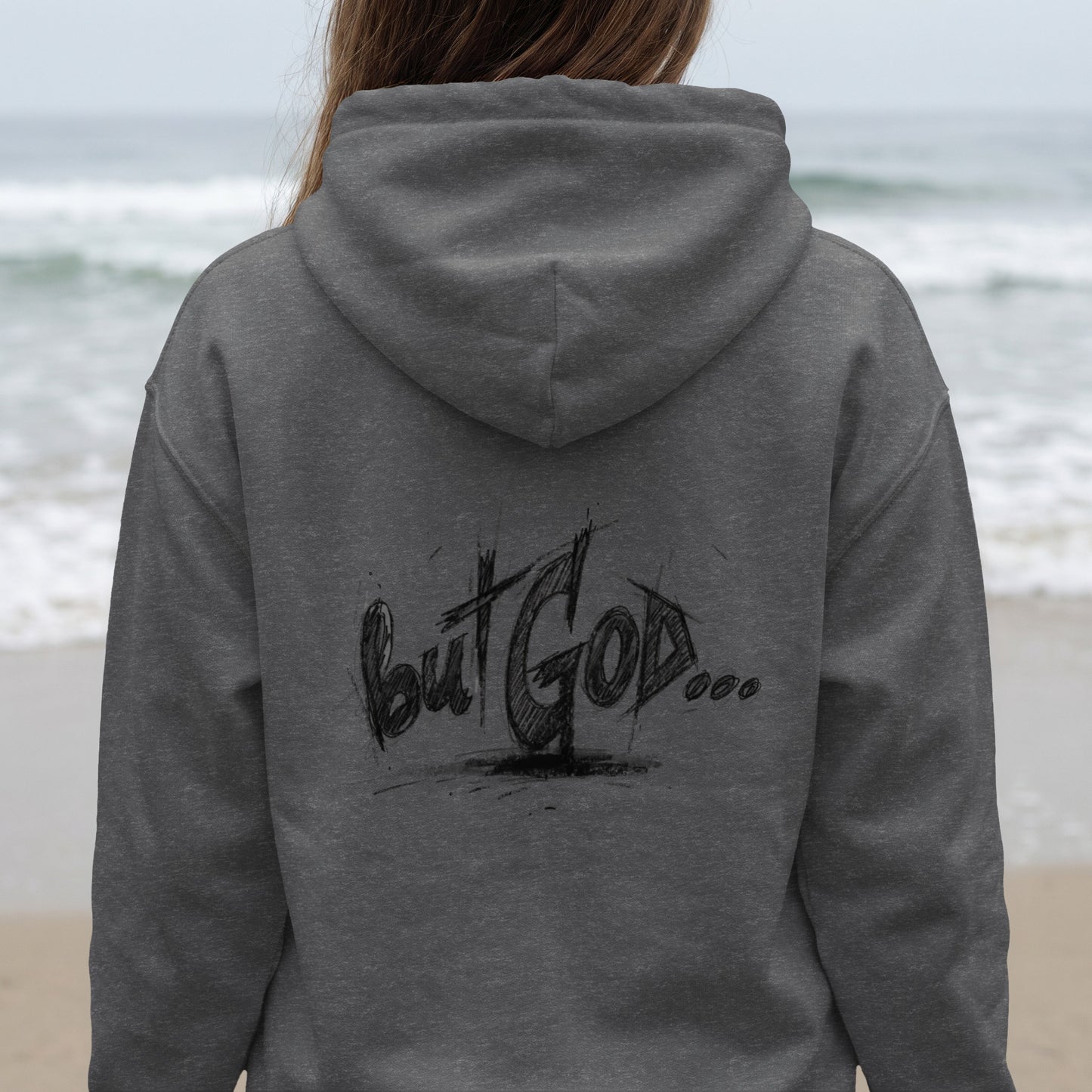 Dark grey hoodie with "But GOD..." in a scribbled font on the back.