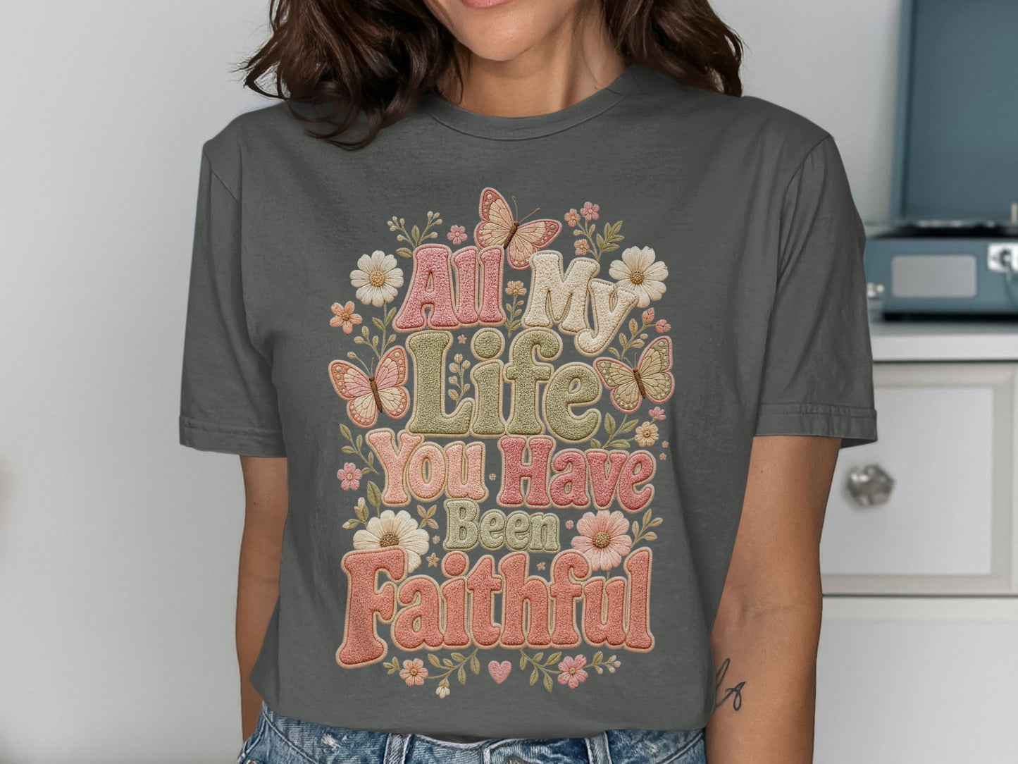 T-shirt with "All My Life You Have Been Faithful" text and floral butterfly design.