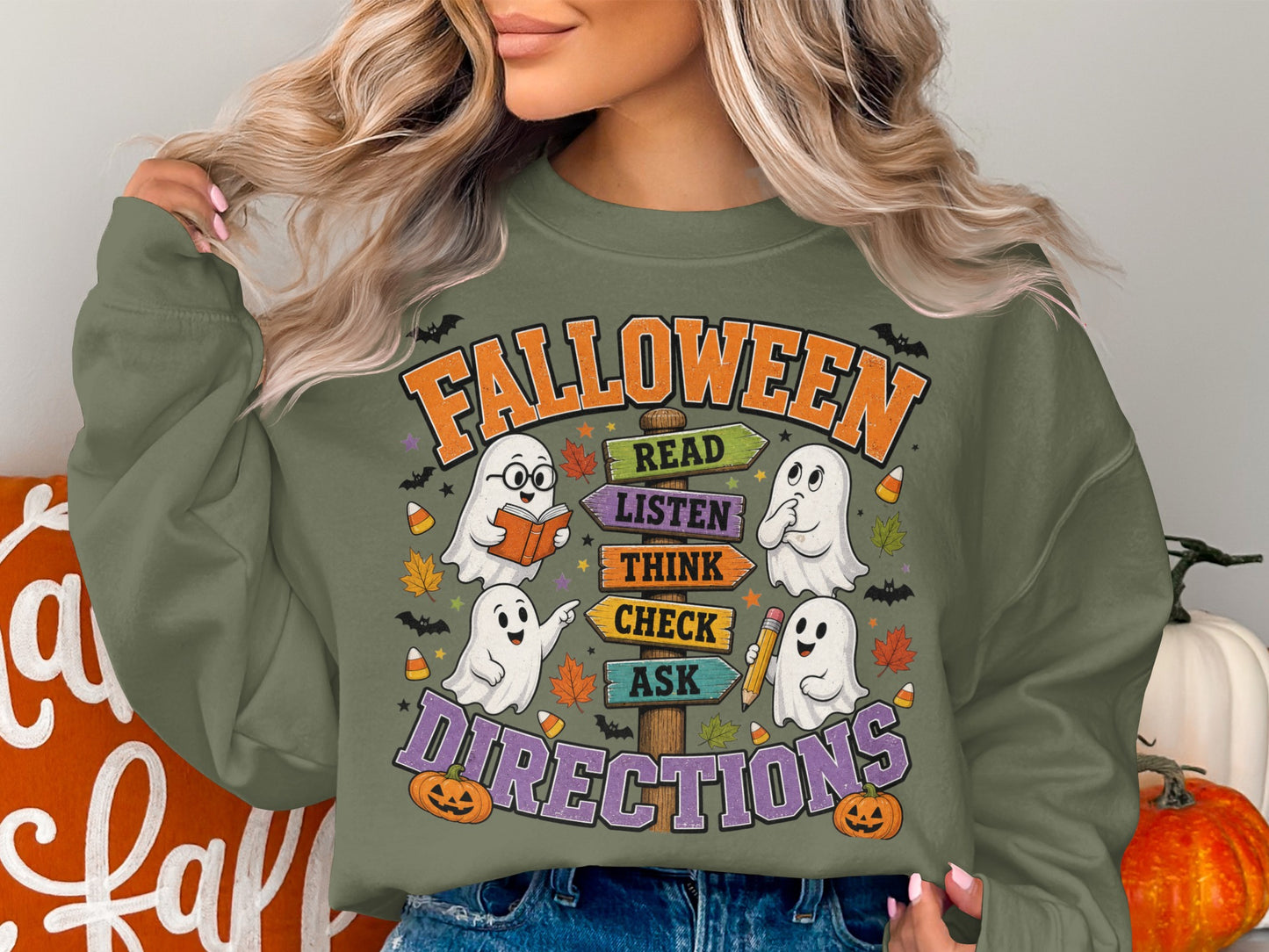 Halloween shirt with ghosts, pumpkins, and directional signs for reading, listening, thinking, checking, and asking.