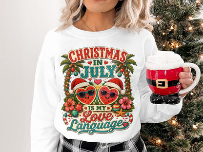 Sweatshirt with "Christmas in July" text and two heart characters wearing sunglasses.