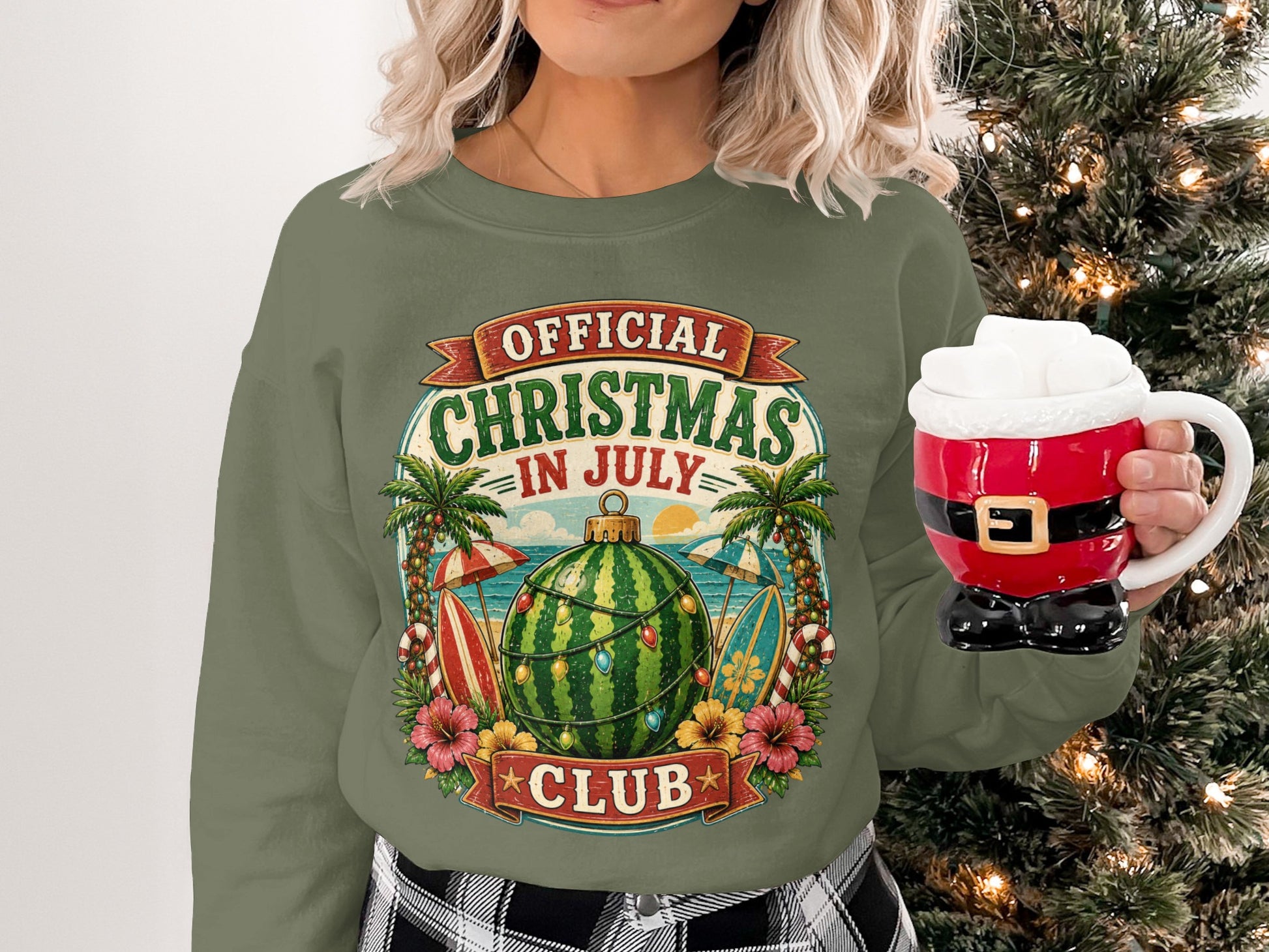 Green sweatshirt with "Official Christmas in July Club" graphic featuring a watermelon.