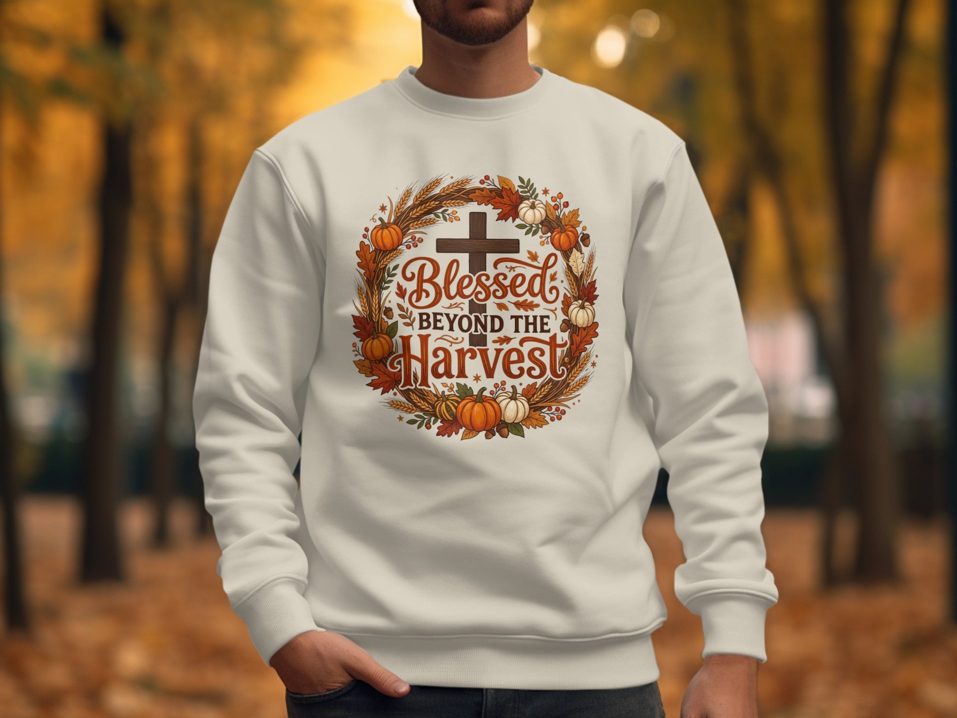 Cream sweatshirt with "Blessed Beyond the Harvest" text and a fall wreath.