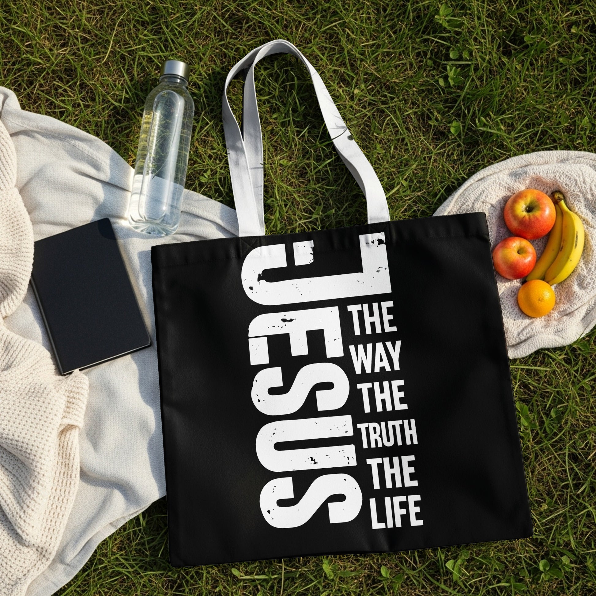 Black tote bag with "JESUS THE WAY THE TRUTH THE LIFE" text.