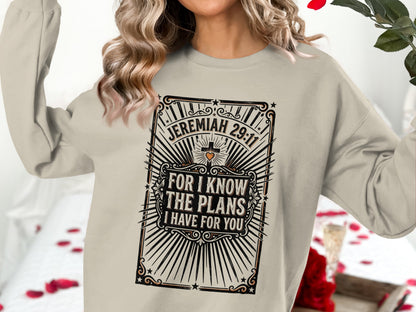 Cream sweatshirt with "Jeremiah 29:11 For I know the plans I have for you" text.