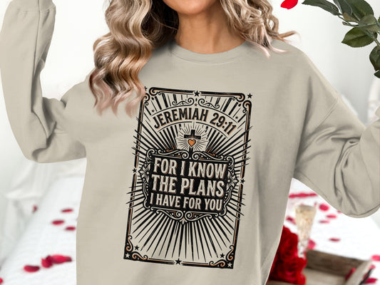 Cream sweatshirt with "Jeremiah 29:11 For I know the plans I have for you" text.