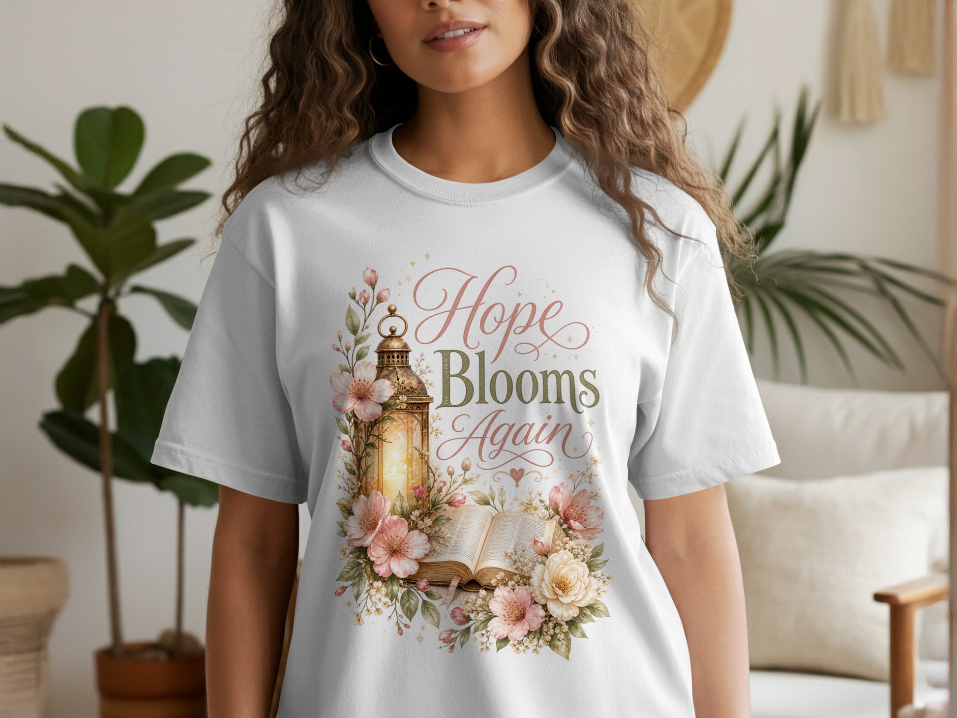 White t-shirt with "Hope Blooms Again" text and floral lantern design.