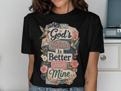 Black t-shirt with "God's Plan Is Better Than Mine" text, floral, and hummingbird accents.