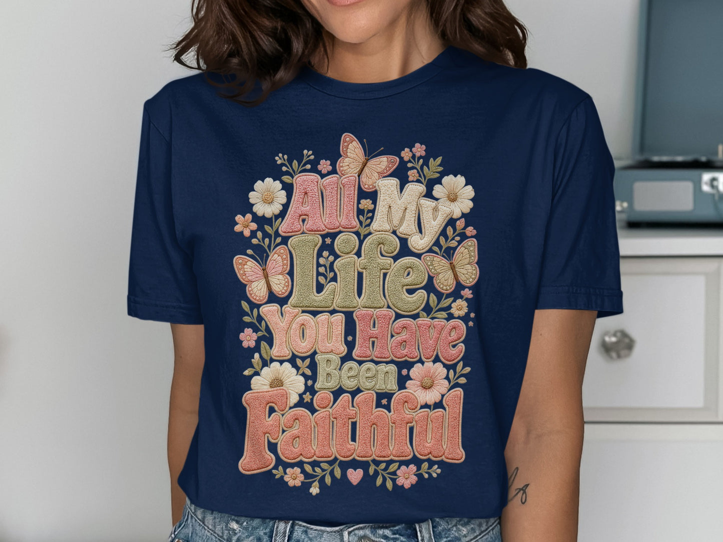 Dark blue t-shirt with "All My Life You Have Been Faithful" text and floral butterflies.