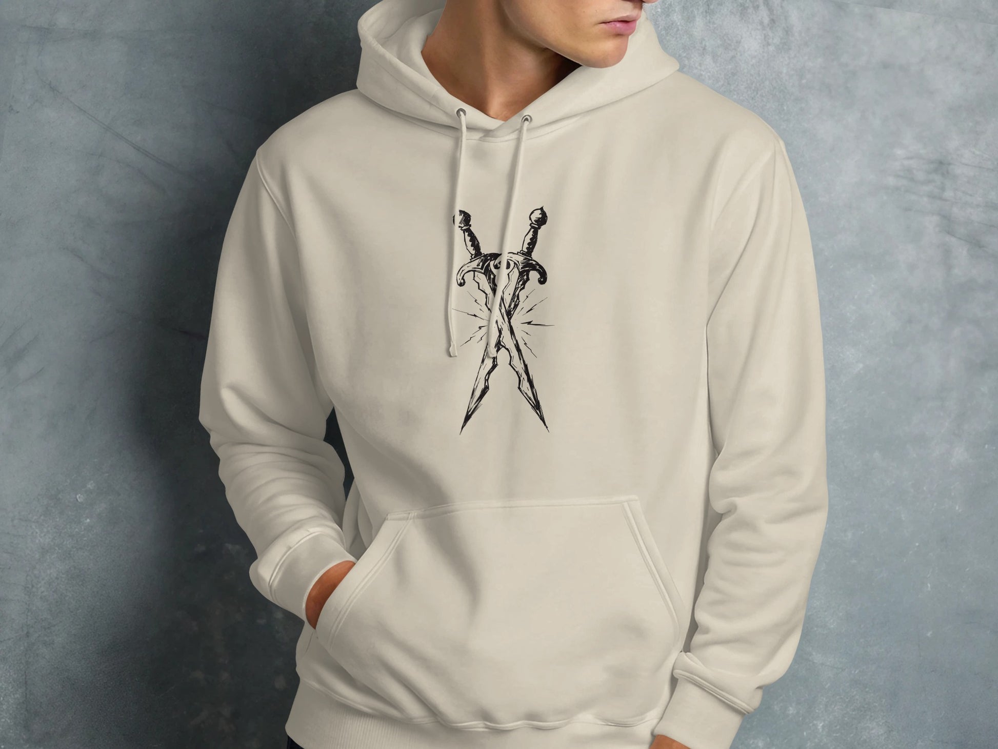 Cream hoodie with crossed daggers graphic on chest.