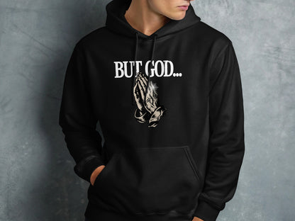 Black hoodie with "BUT GOD..." text and praying hands graphic.