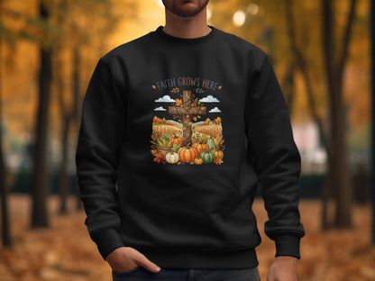 Black sweatshirt with fall harvest scene and "Faith Grows Here" text.