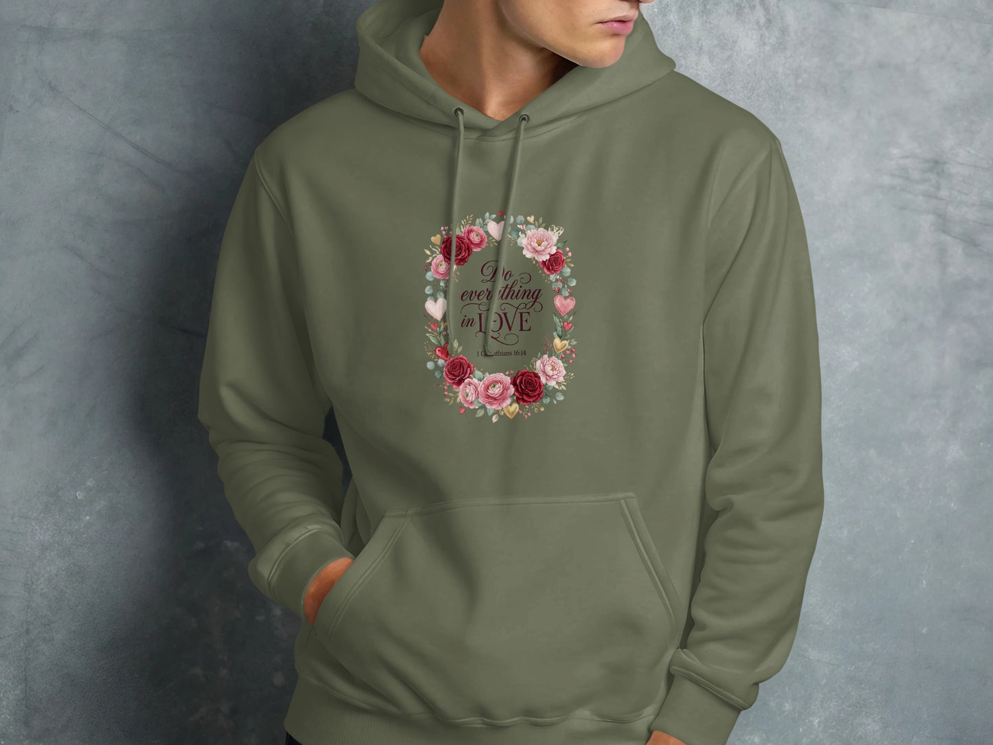 Green hoodie with floral wreath and "Do everything in love" text.