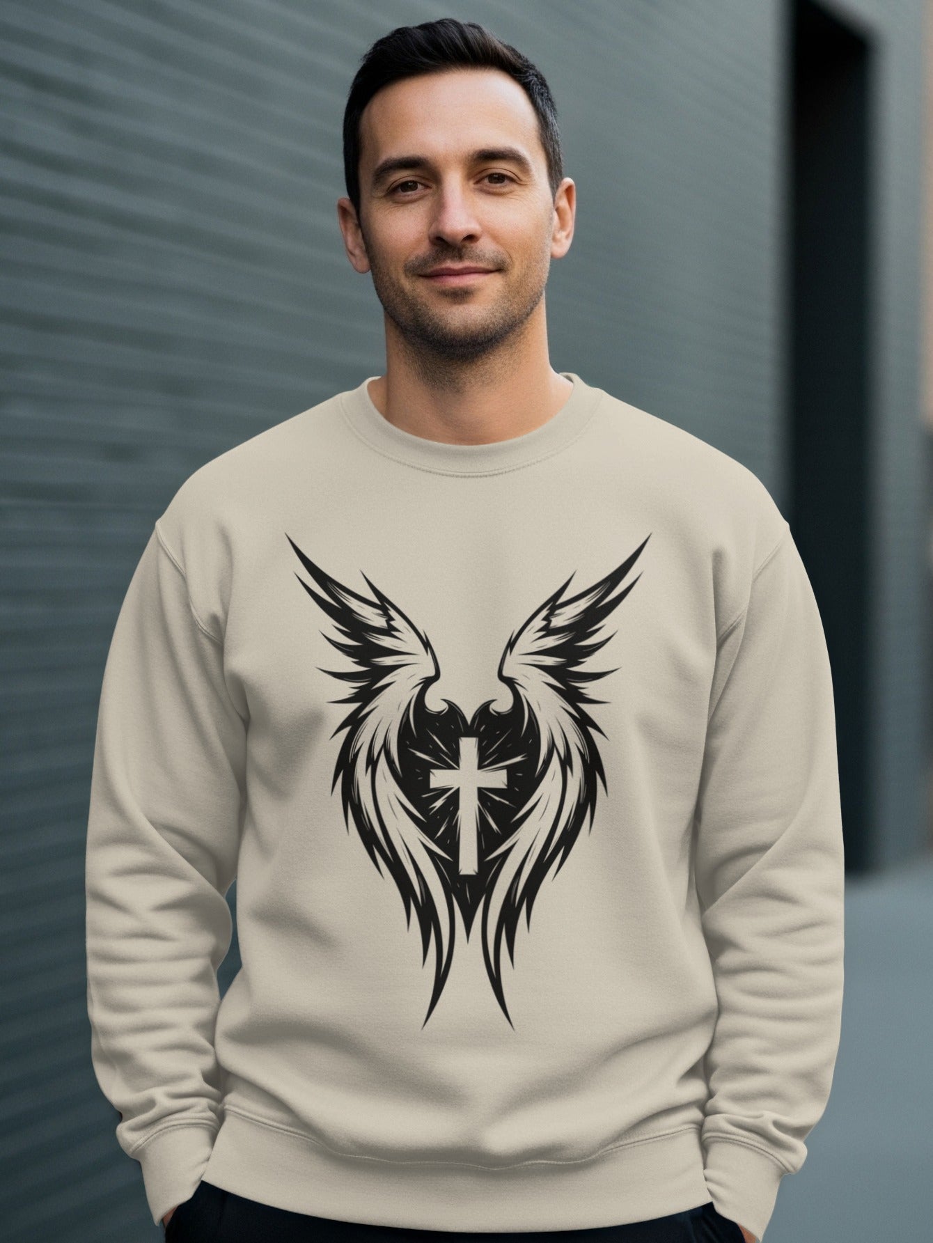 Cream sweatshirt with black winged cross graphic.