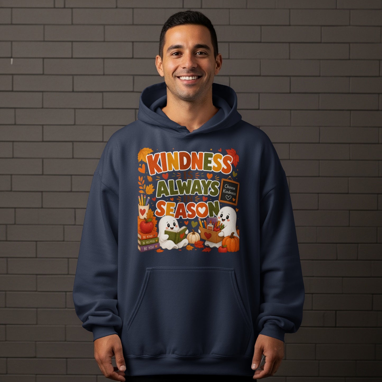 Navy hoodie with "Kindness Always Season" text and cute ghost graphics.