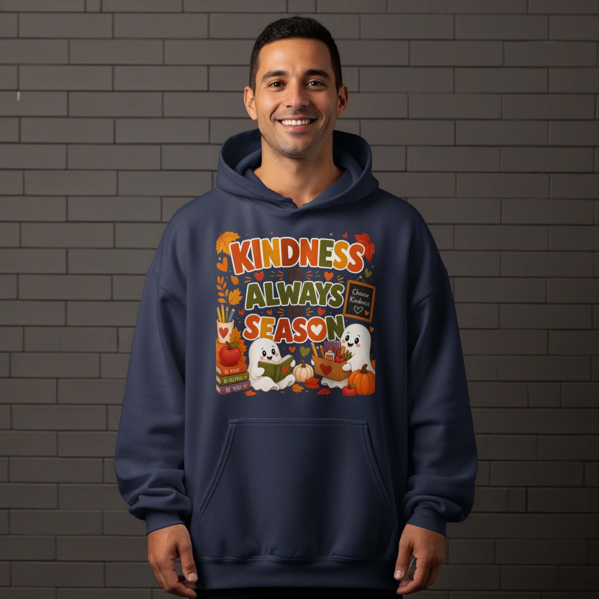 Navy hoodie with "Kindness Always Season" text and cute ghost graphics.