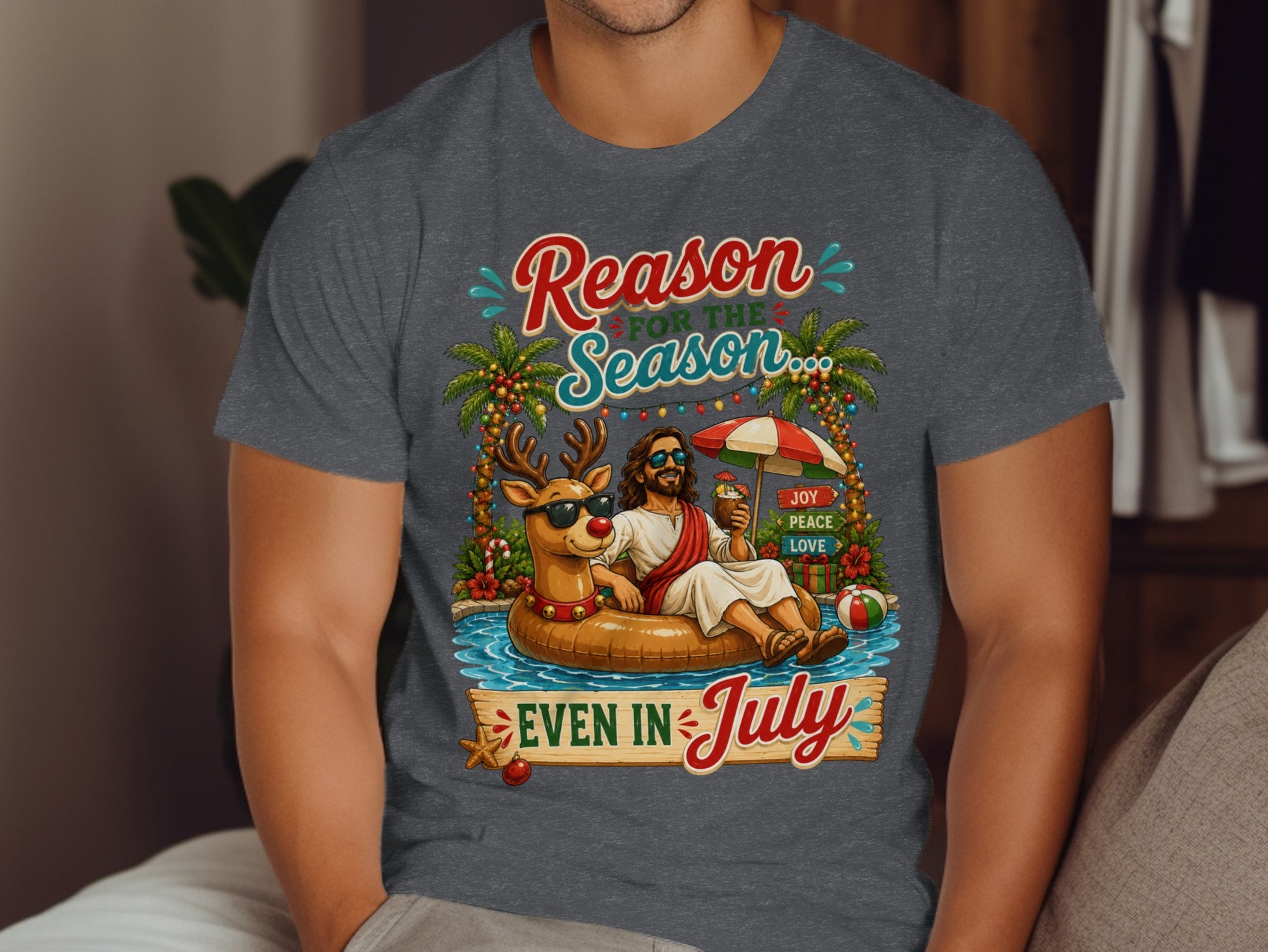 Jesus in a floaty with a reindeer, text "Reason for the Season, Even in July".