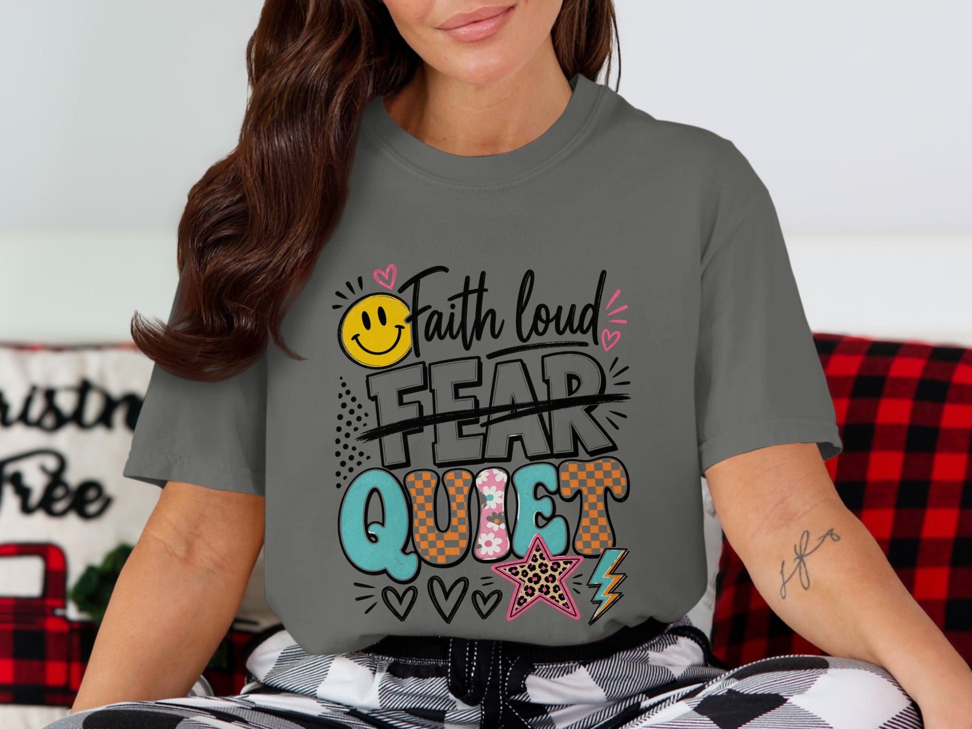 Gray t-shirt with "Faith loud" and "Quiet" text, crossed-out "FEAR".