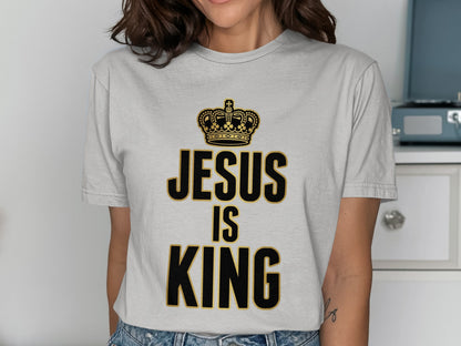 Grey t-shirt with "Jesus is King" text and a crown graphic.