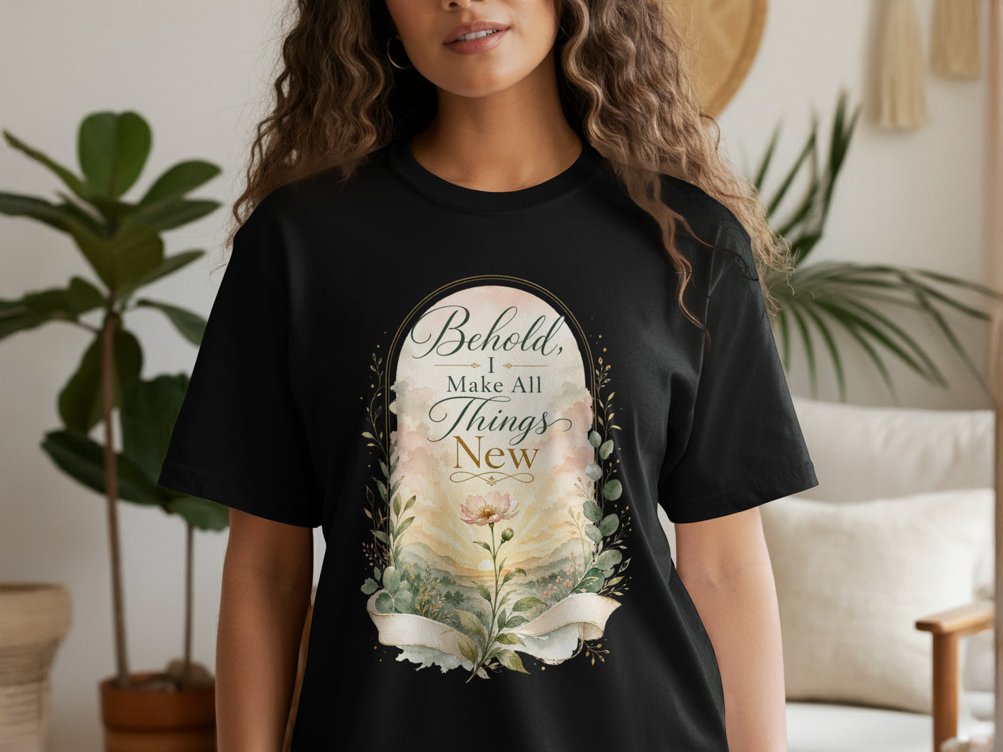 Black t-shirt with "Behold, I Make All Things New" text and floral motif.