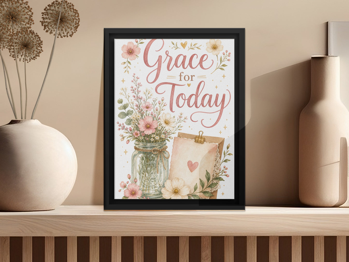 Framed art with "Grace for Today" text, floral jar, and heart-stamped letter.