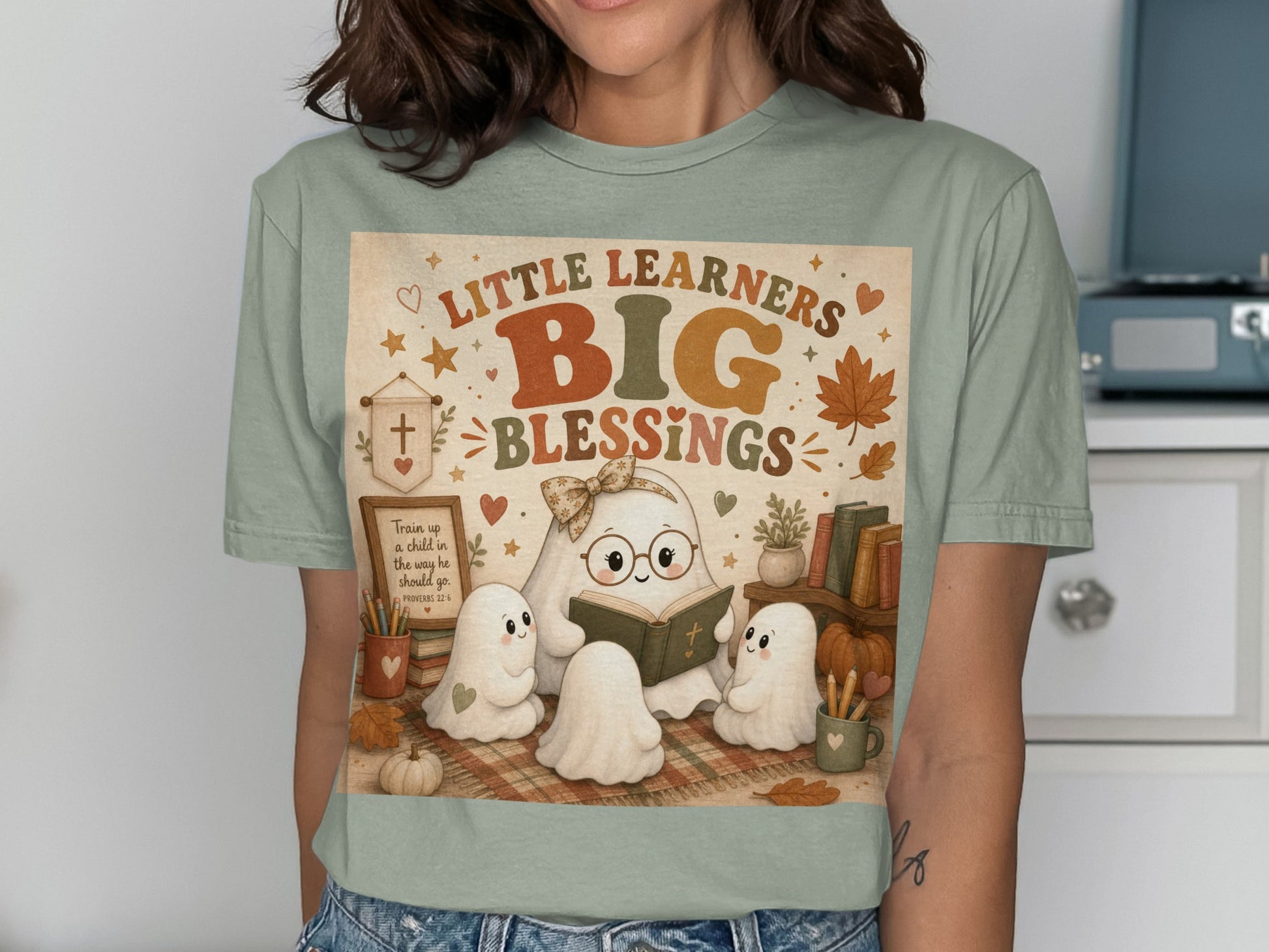 Little Learners Big Blessings ghost family reading a book with Bible verse.