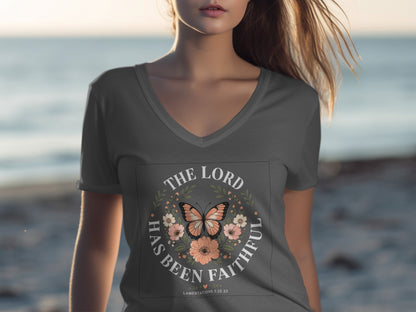 Grey v-neck t-shirt with "The Lord has been faithful" text and floral butterfly design.