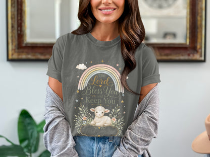 Gray t-shirt with pastel rainbow, lamb, and text "The Lord Bless You and Keep You."