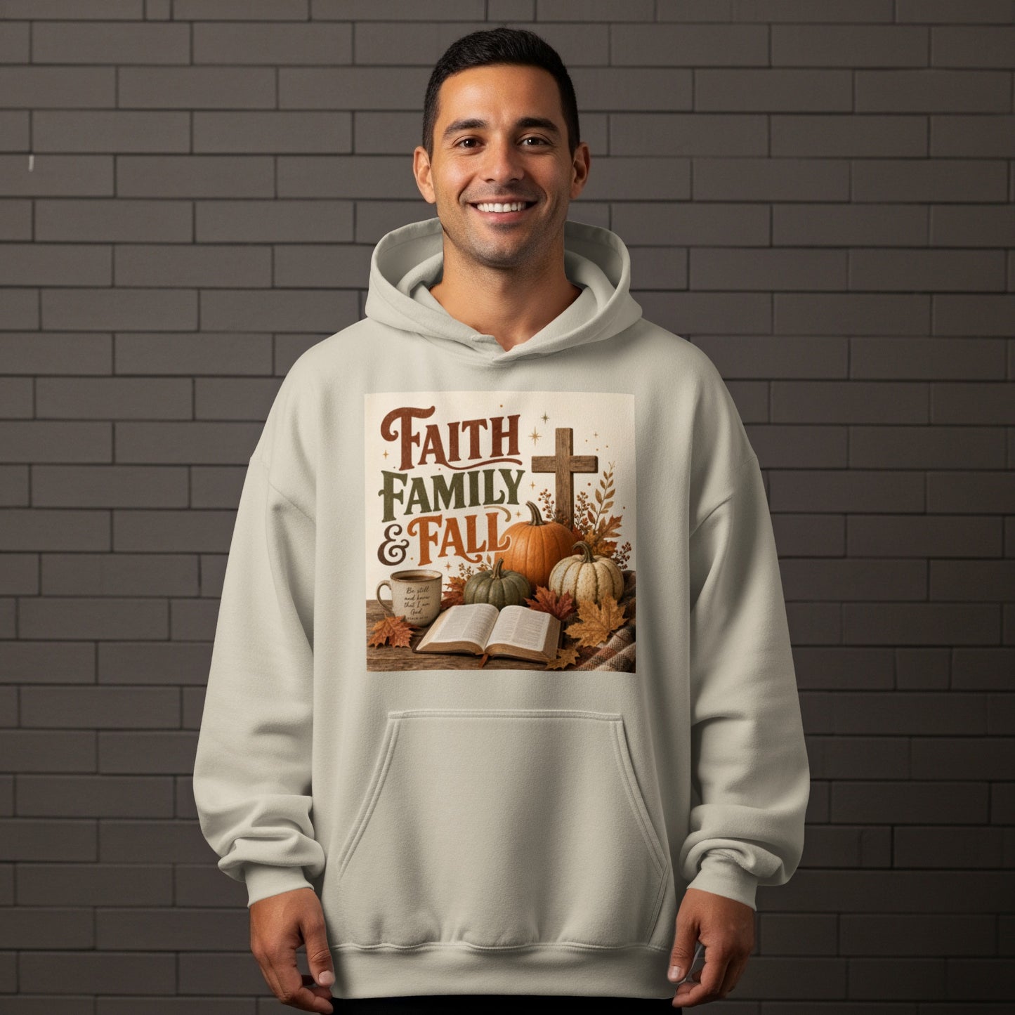 Light beige hoodie with "Faith Family & Fall" graphic featuring pumpkins, a cross, and a Bible.